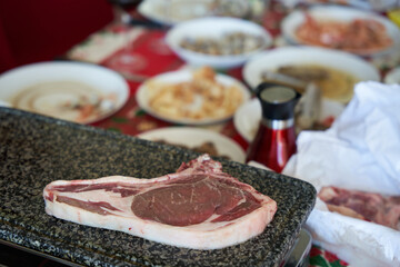 Meat cooked on stone with christmas decoration