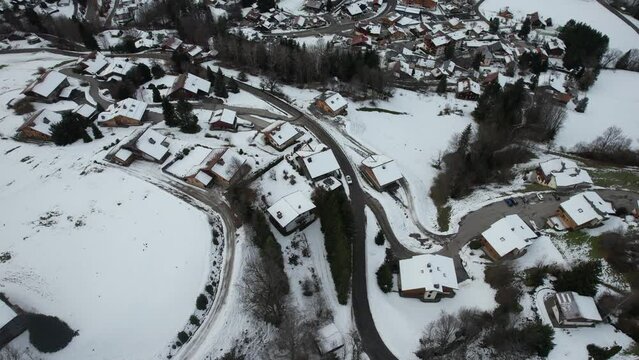 Aerial tilt shift discovering the city of Saint-Jean-de-Sixt near La Clusaz in France