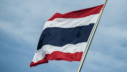 Thailand national flag against to blue sky