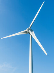 Close-up of wind power systems with a blue sky background on the west coast of Taiwan.