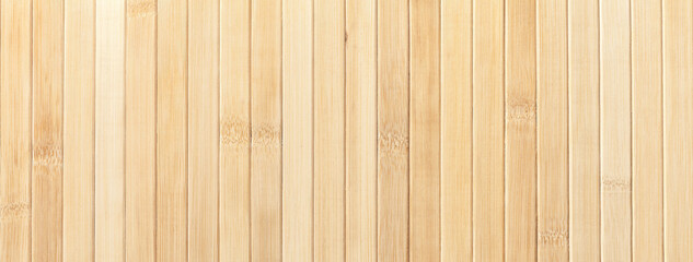 Obraz premium Texture and structure of wooden light beige background, macro. Bamboo traditional napkin for a table.