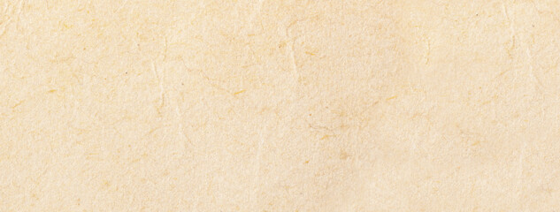 Texture of beige old paper, crumpled background. Vintage craft parchment cardboard.