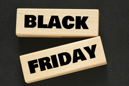 BLACK FRIDAY words on wooden blocks. November is promotion time in stores and online.