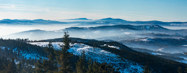 Moravskoslezske Beskydy mountains from Barania gora hill summit in winter Beskid Slaski mountains...