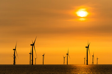 Sunset view of the Offshore wind power systems off the western coast of Taiwan.