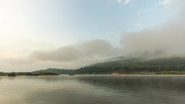 Set up a camera to capture the atmosphere of Kaeng Ko Reservoir. Lamphun, Thailand Let the camera float and roll with the flow.