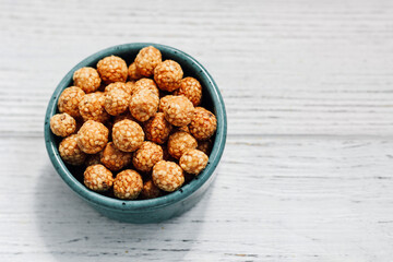 organic chickpea candies sprinkled with sesame and caramel