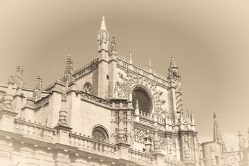Seville cathedral. Old postcard style - vintage paper sepia tone retro style.