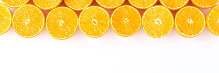 Overhead shot of juicy oranges on white background