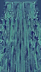 teal and blue textured surface design in tall vertical format