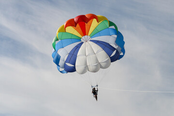 A Breathtaking Parasailing Experience: High Above the Skies on a Sunny Day