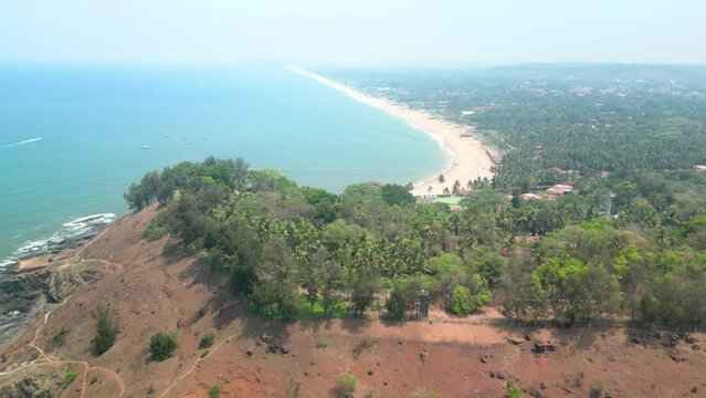 Goa, India: Aerial view of Indian summer resort by Arabian Sea, famous Sinquerim Beach and Sinquerim Fort - landscape panorama of South Asia from above