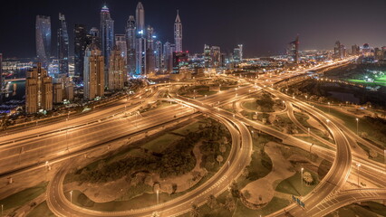 Fototapeta na wymiar Dubai Marina highway intersection spaghetti junction all night timelapse