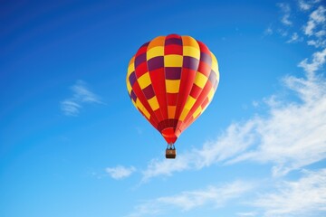 Fototapeta na wymiar balloon soaring high in the clear blue sky