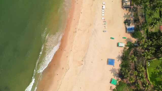 Goa, India: Aerial view of Indian summer resort by Arabian Sea, famous Sinquerim Beach and Sinquerim Fort - landscape panorama of South Asia from above
