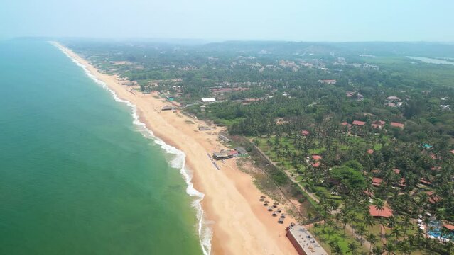 Goa, India: Aerial view of Indian summer resort by Arabian Sea, famous Goa Beaches (Sinquerim, Candolim, Calangute and Baga Beach) - landscape panorama of South Asia from above