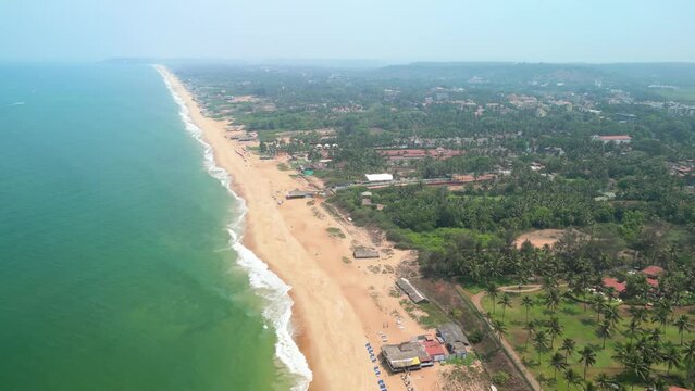 Goa, India: Aerial view of Indian summer resort by Arabian Sea, famous Goa Beaches (Sinquerim, Candolim, Calangute and Baga Beach) - landscape panorama of South Asia from above