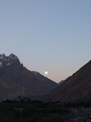 Naklejka premium moonrise in the mountains