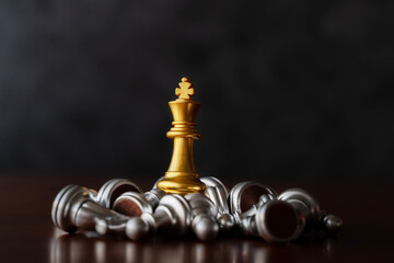 Stand of gold king chess and silver king chess tumbler, business competition winner and marketing strategy planning. © jittawit21