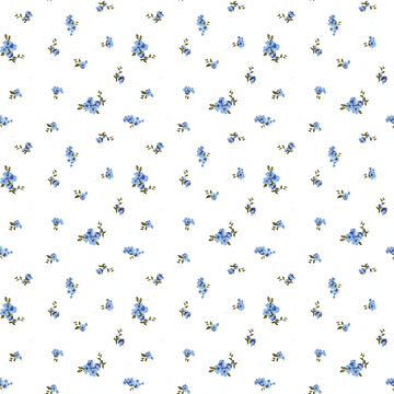 Cute pattern in small flower. Small colorful flowers. Blue background. Floral seamless pattern.