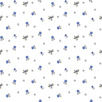 Cute pattern in small flower. Small colorful flowers. Blue background. Floral seamless pattern.