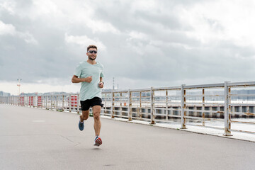 Motivation for fitness. Psychological health during cardio exercise. Runner exercise is hardy. The...