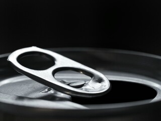 Open drink can and ring closeup 