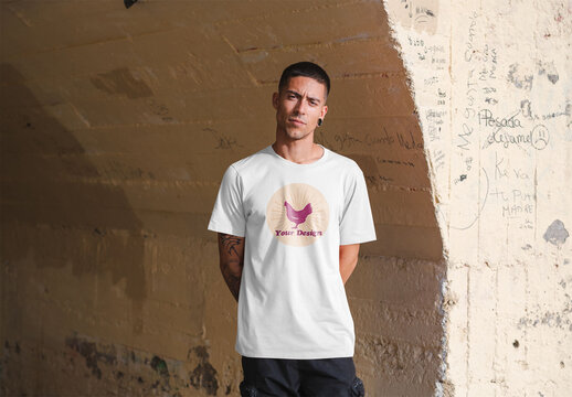 Mockup of man wearing t-shirt with customizable by underpass