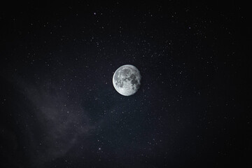 Fototapeta na wymiar Full Moon phase and surrounded by stars.