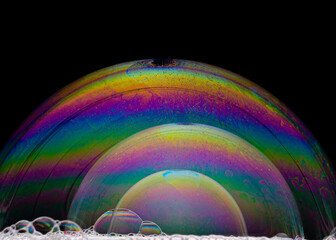 Soap bubbles composition on a black background