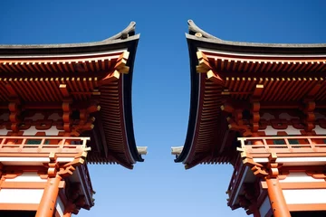 Küchenrückwand glas motiv detail shot of a shinto shrines torii gates, with a clear sky © Alfazet Chronicles