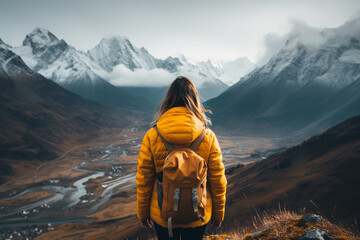 Young girl wearing a vibrant yellow jacket, arriving at the end of the hike, representing the spirit of adventure, accomplishment, and the pursuit of dreams. Ai generated - obrazy, fototapety, plakaty