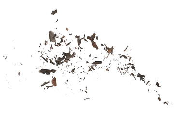 Ash with burned, paper scraps scattered, pieces explosion effect isolated on white background,...