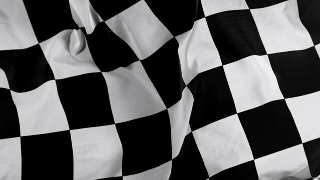 Checkered Race Flag. Slow Motion Wavy closeup fabric fluttering Racing Flags background. Formula One flag car motor sport.