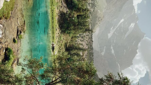The Alaudin (Chapdara) lakes, lying at an altitude of 2800 m, are considered one of the most beautiful lakes of the Fan Mountains. Turquoise mountain lake. Pamiro-Alai. Tajikistan, Pamir 4K