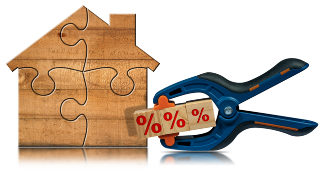 Wooden house made of puzzle pieces and a spring plastic clamp with wooden blocks with red percentage signs, isolated on white or transparent background. Png.