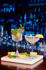 delicious bohemian rhapsody and margarita with decorations on bar counter, concept