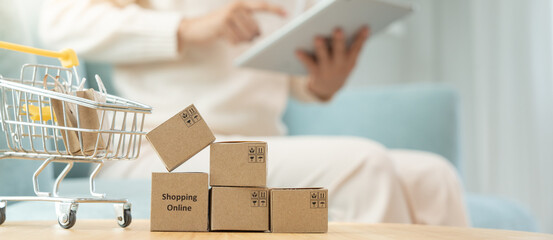 woman using tablet for online shopping at home. stay home, technology, electronic commerce,...