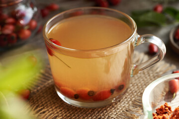 A cup of rosehip tea on a table