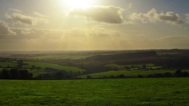 Irish countryside with fields late at the day