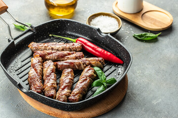 Stuffed Bacon Rolls. minced meat in bacon rolls. Food recipe background. Close up