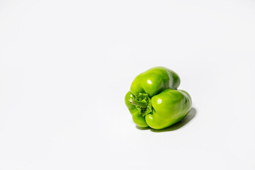ripe green bell pepper on the white background isolated