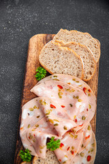 sausage mortadella piece marinated vegetable boiled olive, pickled cucumber, pepper, gherkin eating appetizer meal food snack on the table copy space food background rustic top view