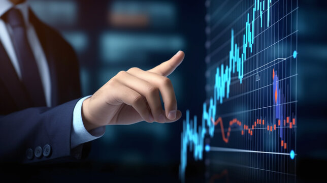 Businessman pointing at stock chart with growth and investment concept