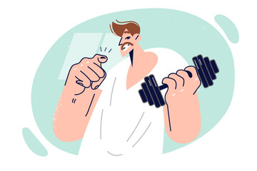 Man holds dumbbell for playing sports and points finger at screen, offering to visit gym together