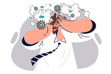 Man engineer feels explosion in head due to overload and burnout at work or own business