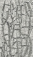 peeling damaged and weathered white paint revealing a grey coloured under-surface