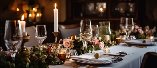 Elegantly adorned chalet wedding table with candles fireplace room banquet dinner With copyspace for text - obrazy, fototapety, plakaty