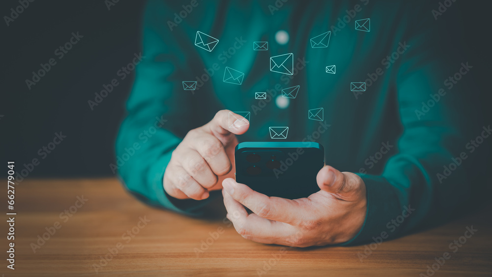 Poster New email notification concept for business e-mail communication and digital marketing. Man using a mobile phone with sending online message with email icon. Inbox receiving electronic message alert.