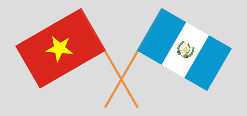 Crossed flags of Vietnam and Guatemala. Official colors. Correct proportion
